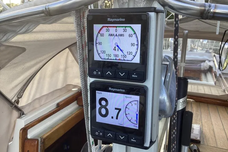 Slide: The Image of Digital navigation instruments on a 1980 F&C 44 sailboat, displaying speed and wind data. - 18