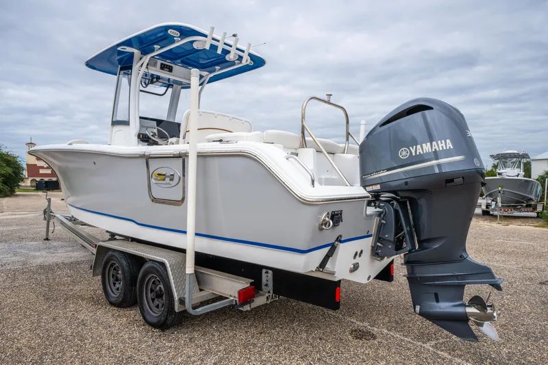 Slide: The Image of 2018 Sea Hunt Ultra 255 SE boat on trailer with Yamaha outboard motor. - 6