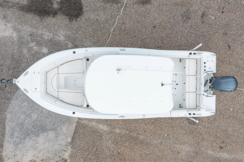 Slide: The Image of Overhead view of 2018 Sea Hunt Ultra 255 SE boat on pavement. - 7