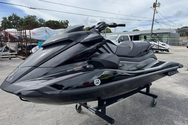 Slide: The Image of 2026 Yamaha WaveRunner GP SVHO in sleek black, displayed outdoors on a stand. - 5