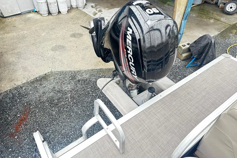 Slide: The Image of 2019 SUNTRACKER Party Barge Pontoon with Mercury 90 HP outboard motor. - 13