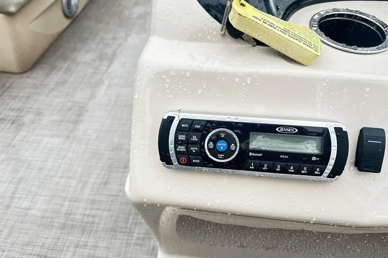 Slide: The Image of Close-up of Jensen audio system on 2019 SUNTRACKER Party Barge Pontoon. - 6