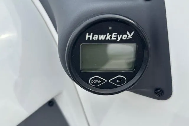 Slide: The Image of HawkEye display on 2022 Tahoe 210 S boat, featuring up and down buttons. - 17