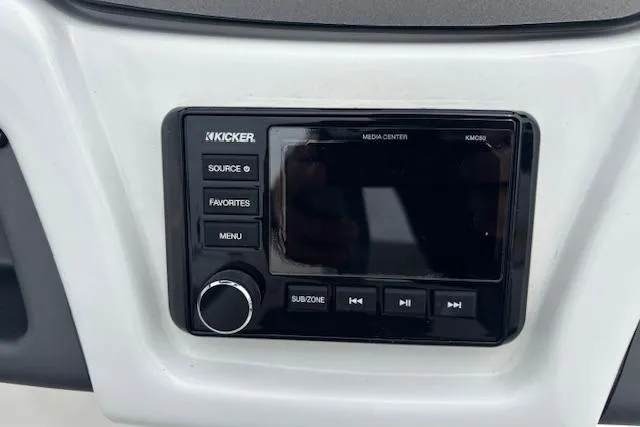Slide: The Image of Kicker media center in 2022 Tahoe 210 S boat dashboard. - 18