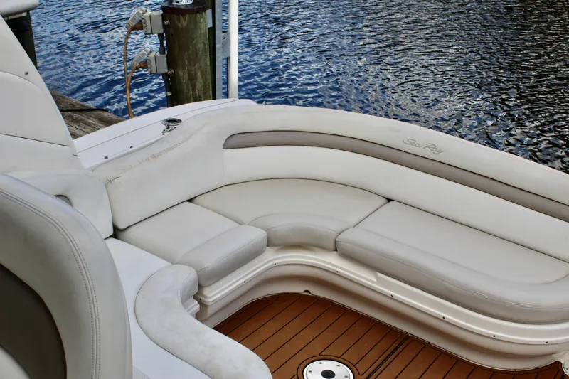 Slide: The Image of Luxurious seating on 2004 Sea Ray 340 Sundancer yacht by the water. - 19