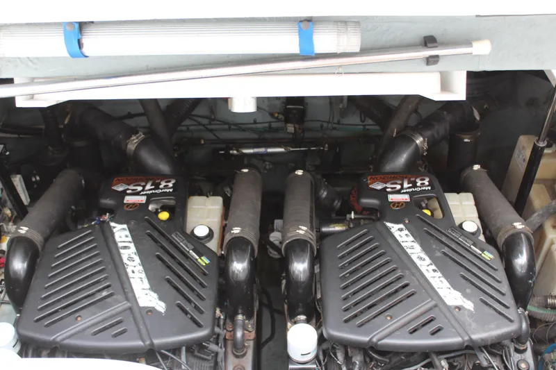 Slide: The Image of Engine compartment of a 2004 Sea Ray 340 Sundancer with twin MerCruiser 8.1S motors. - 34