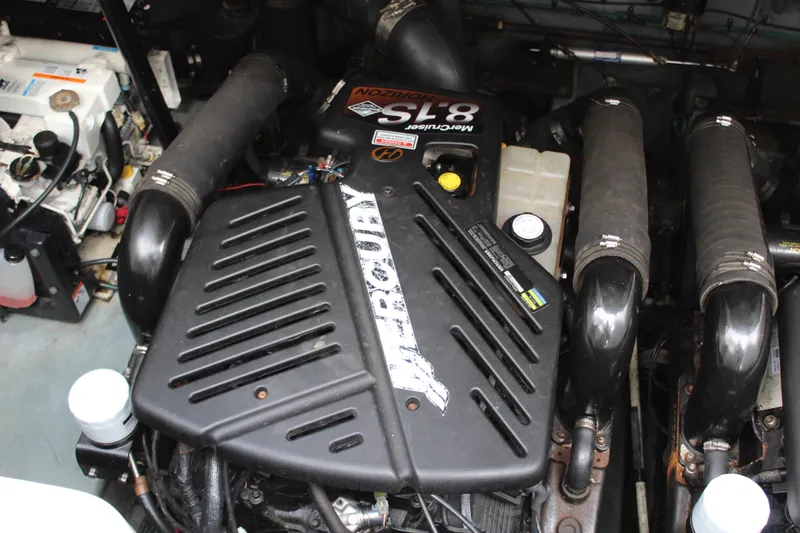 Slide: The Image of Engine compartment of a 2004 Sea Ray 340 Sundancer with MerCruiser 8.1S motor. - 36