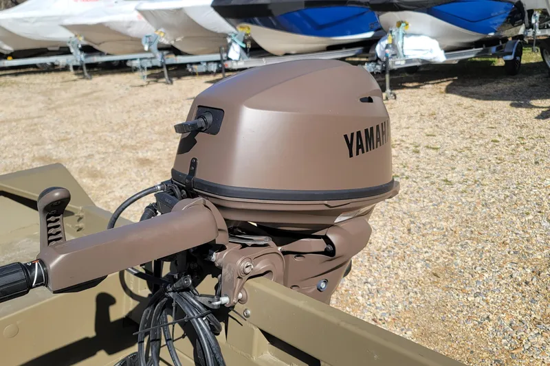 Slide: The Image of Yamaha outboard motor on 2026 G3 Gator Tough 15 FL boat, parked on gravel. - 8