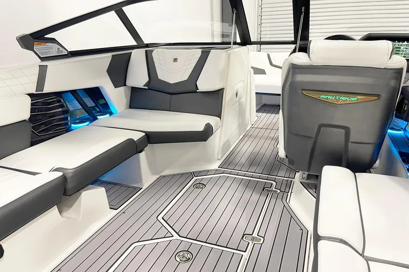 Slide: The Image of 2023 Nautique Super Air Nautique G23 interior with sleek seating and modern design. - 7