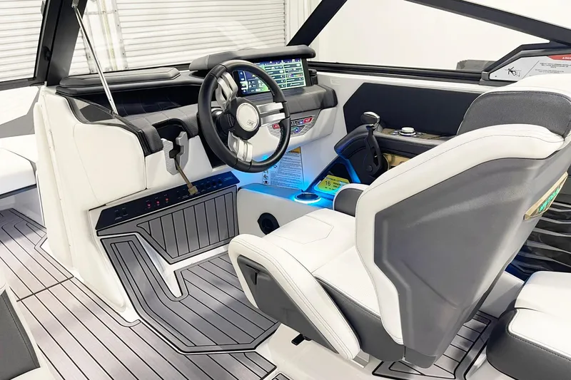 Slide: The Image of 2023 Nautique Super Air Nautique G23 cockpit with modern controls and sleek design. - 8