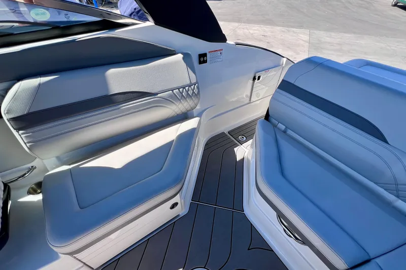 Slide: The Image of 2024 Sea Ray SLX 260 Outboard interior with sleek seating and modern design. - 20