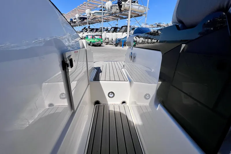 Slide: The Image of 2024 Sea Ray SLX 260 Outboard boat interior with sleek deck design. - 21