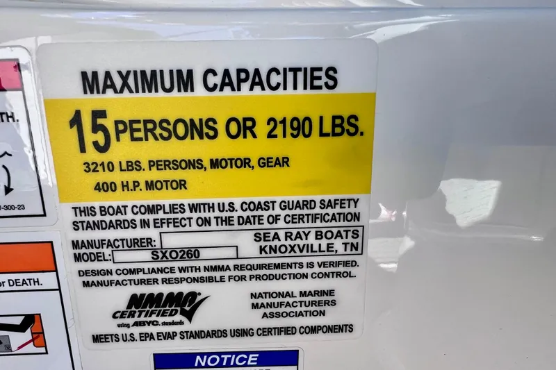 Slide: The Image of 2024 Sea Ray SLX 260 Outboard capacity label: 15 persons or 2190 lbs, 400 HP motor. - 39