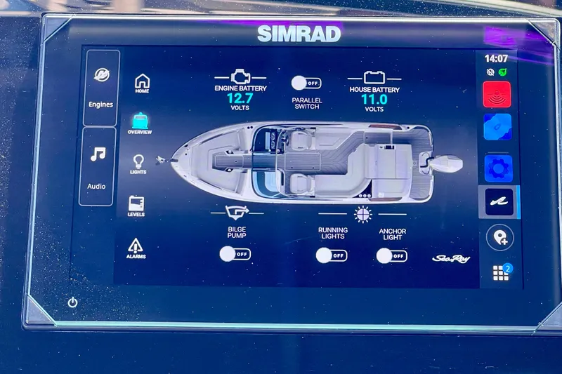 Slide: The Image of Simrad display on 2024 Sea Ray SLX 260 Outboard showing battery and system controls. - 43