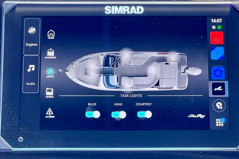 Slide: The Image of Simrad display showing 2024 Sea Ray SLX 260 Outboard boat controls and layout. - 44