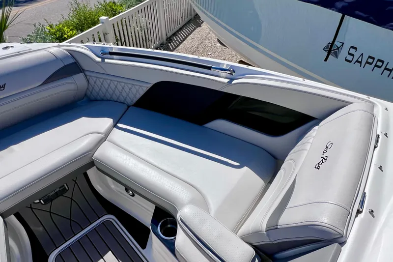 Slide: The Image of Luxurious seating on 2024 Sea Ray SLX 260 Outboard boat, featuring elegant design and comfort. - 53
