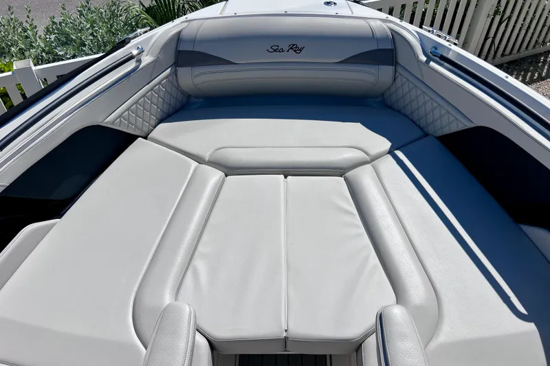 Slide: The Image of 2024 Sea Ray SLX 260 Outboard boat interior with luxurious seating and elegant design. - 60