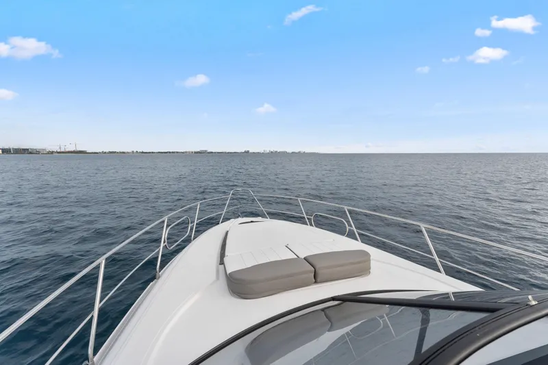 Slide: The Image of Luxury Valiatt 380GT yacht cruising on open sea, 2025 model. - 17