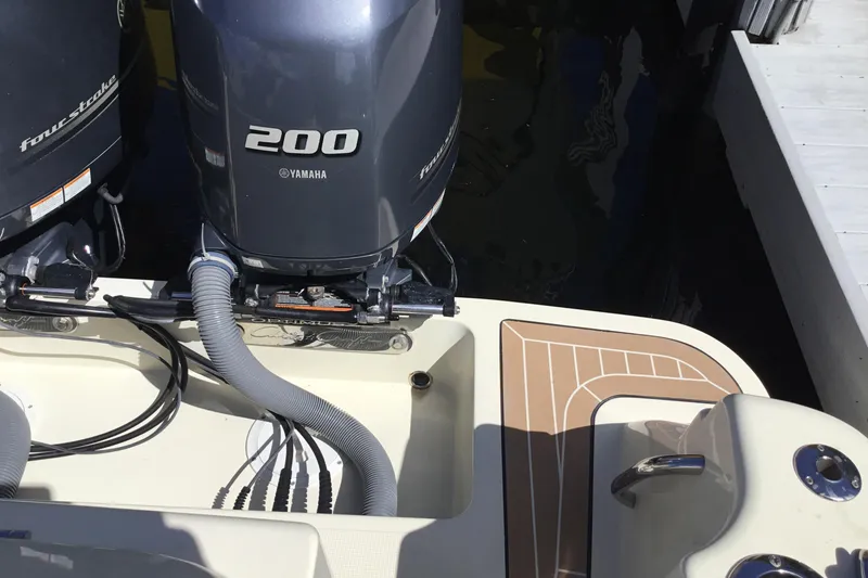 Slide: The Image of 2016 Chris-Craft Calypso 26 with Yamaha 200 outboard engines at dock. - 30
