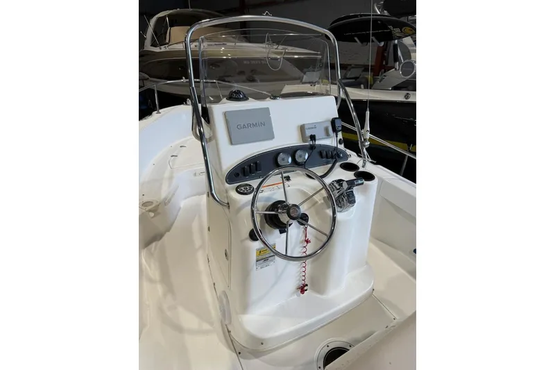 Slide: The Image of 2008 Boston Whaler 190 Outrage boat console with Garmin navigation system. - 3