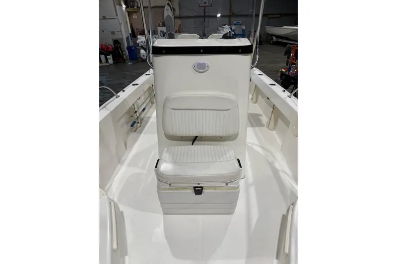 Slide: The Image of 2008 Boston Whaler 190 Outrage dashboard with navigation and communication equipment. - 6