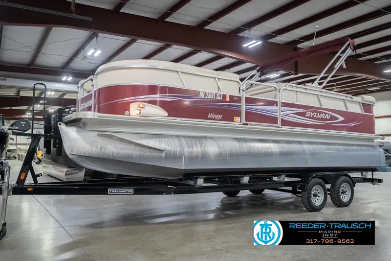Slide: The Image of 2010 Sylvan 8522 Mirage Cruise pontoon boat on trailer in indoor showroom. - 3