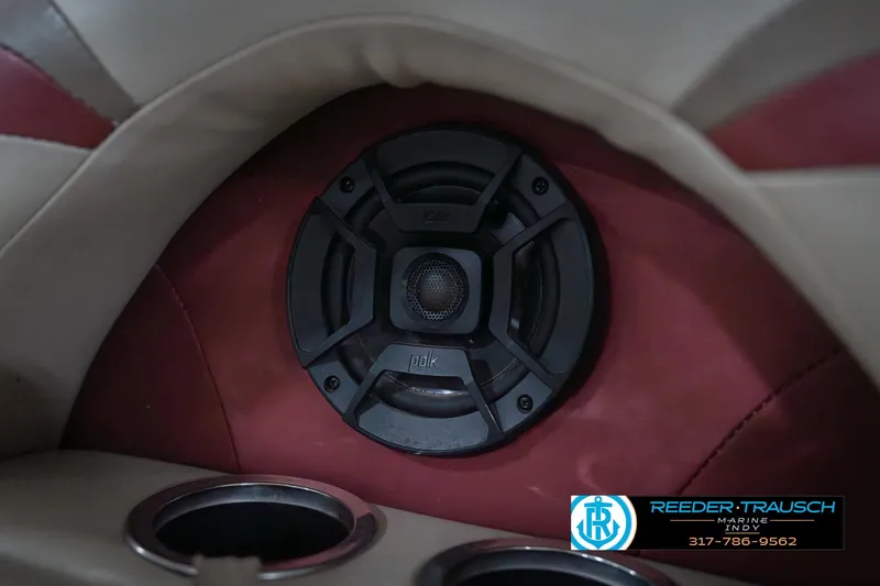 Slide: The Image of Speaker and cup holder in 2010 Sylvan 8522 Mirage Cruise boat interior. - 43