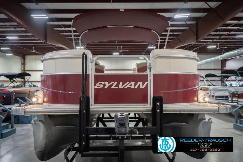 Slide: The Image of 2010 Sylvan 8522 Mirage Cruise pontoon boat in indoor showroom. - 5