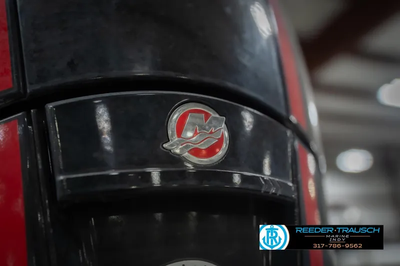 Slide: The Image of Close-up of 2010 Sylvan 8522 Mirage Cruise boat emblem with dealership logo. - 50