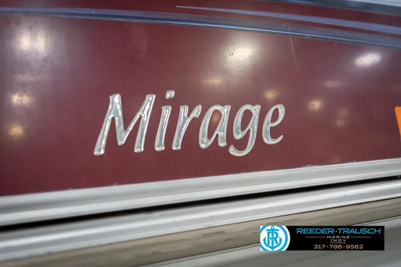 Slide: The Image of 2010 Sylvan 8522 Mirage Cruise boat logo on maroon background. - 53