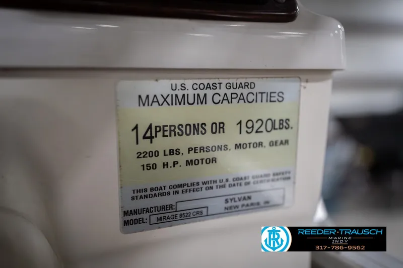 Slide: The Image of 2010 Sylvan 8522 Mirage Cruise capacity label, 14 persons or 1920 lbs, 150 HP motor. - 58