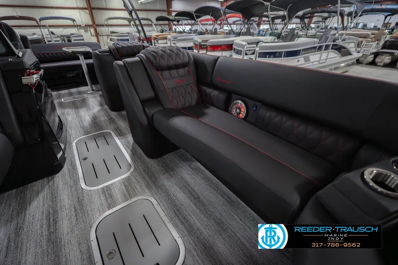 Slide: The Image of Luxurious interior of 2026 Bennington 25 RSB pontoon boat with plush seating. - 23