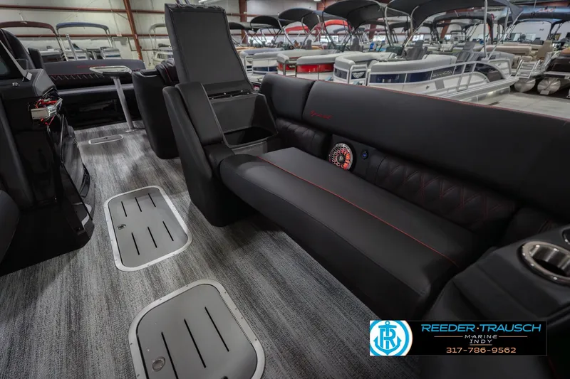Slide: The Image of Luxurious interior of 2026 Bennington 25 RSB pontoon boat with sleek seating and modern design. - 25