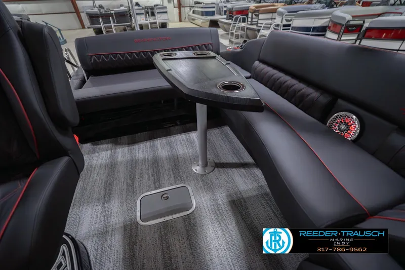 Slide: The Image of Luxurious interior of 2026 Bennington 25 RSB boat with sleek seating and table. - 29