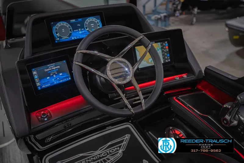 Slide: The Image of Steering console of 2026 Bennington 25 RSB with digital displays and controls. - 36