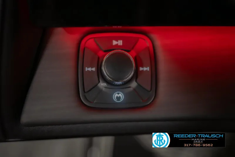 Slide: The Image of Control panel of 2026 Bennington 25 RSB with illuminated buttons and volume knob. - 38