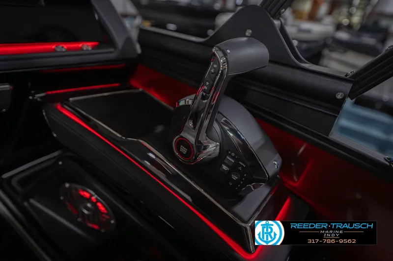 Slide: The Image of Control panel of a 2026 Bennington 25 RSB boat with illuminated accents. - 42