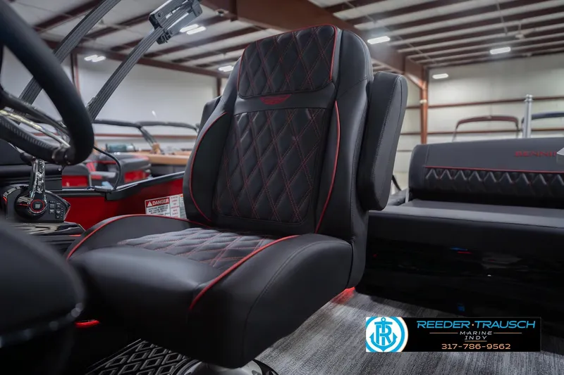 Slide: The Image of Luxurious seating in 2026 Bennington 25 RSB boat with diamond stitching and red accents. - 43