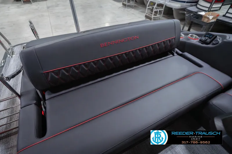 Slide: The Image of 2026 Bennington 25 RSB boat seat with red stitching and logo, showcased at Reeder Trausch Marine. - 45