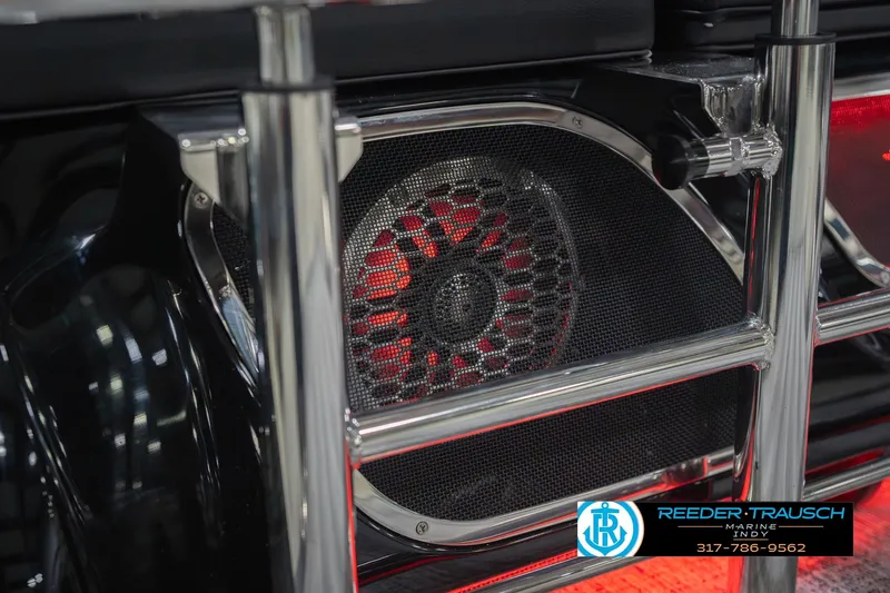 Slide: The Image of Close-up of a 2026 Bennington 25 RSB boat speaker with chrome detailing. - 49