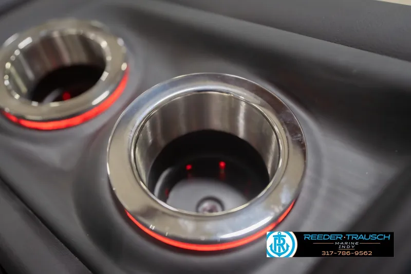 Slide: The Image of LED-lit cup holders in 2026 Bennington 25 RSB boat interior. - 50