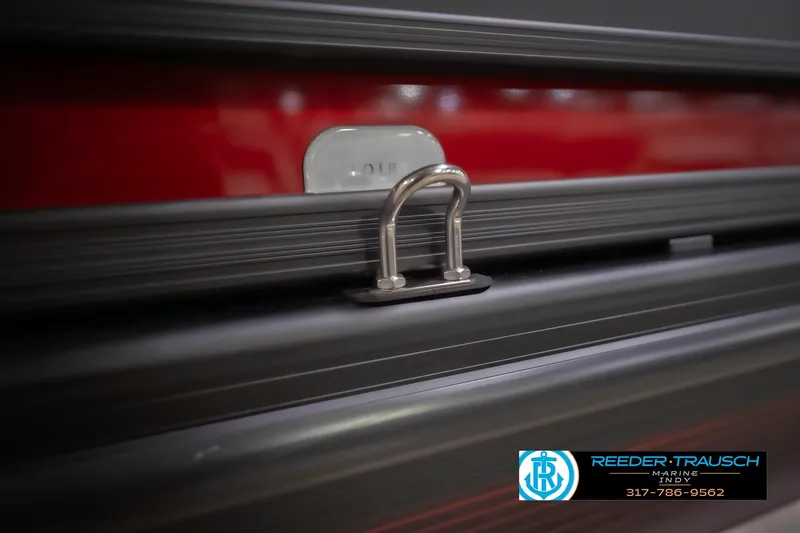 Slide: The Image of Close-up of 2026 Bennington 25 RSB boat detail with Reeder-Trausch Marine logo. - 58