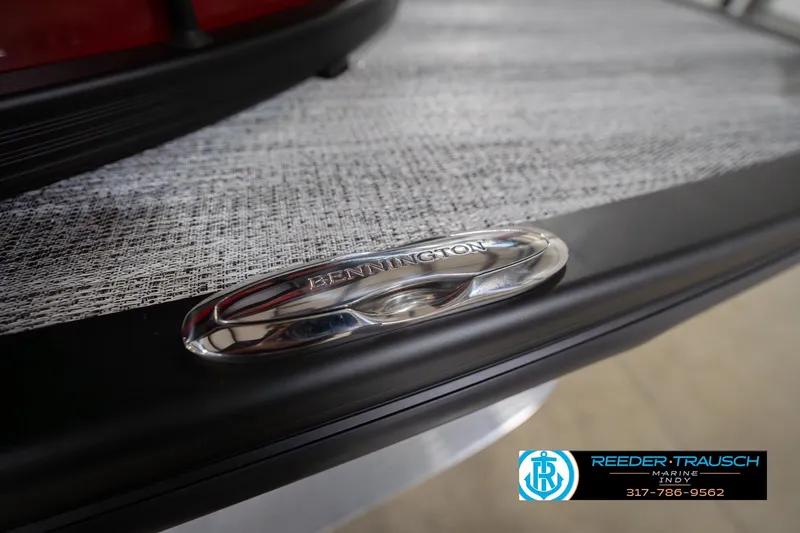 Slide: The Image of 2026 Bennington 25 RSB boat detail with logo, showcased at Reeder Trausch Marine. - 59