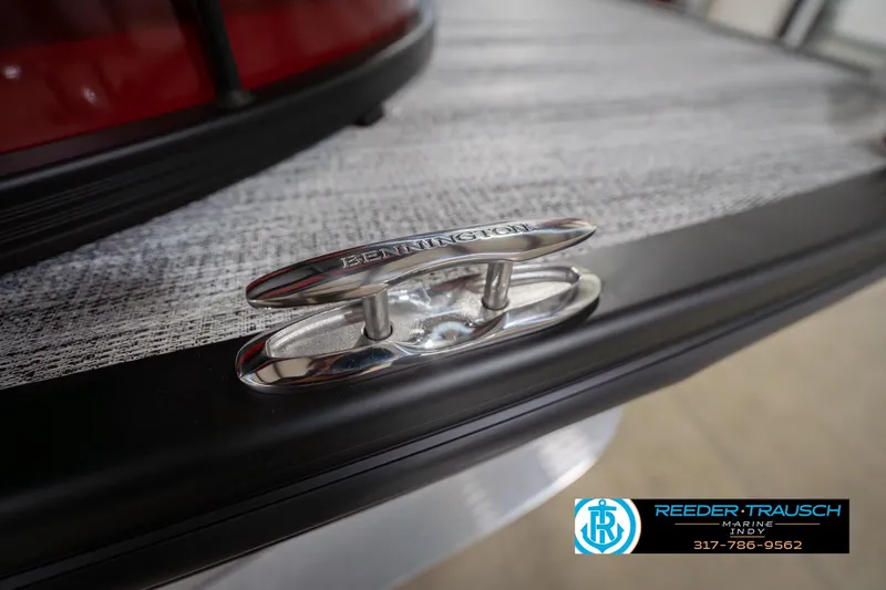 Slide: The Image of Close-up of a 2026 Bennington 25 RSB boat cleat with branding. - 60