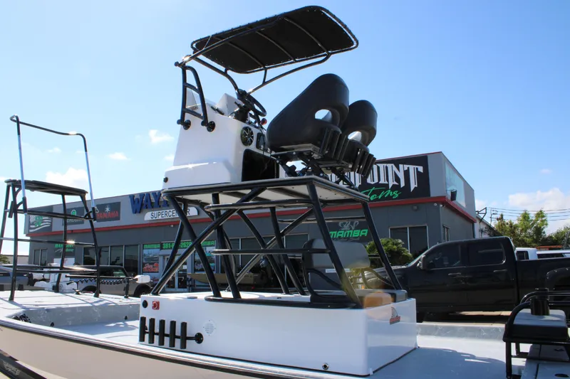 Slide: The Image of 2024 Shoalwater 23 Catamaran with dual speakers on deck, showcasing modern design. - 12