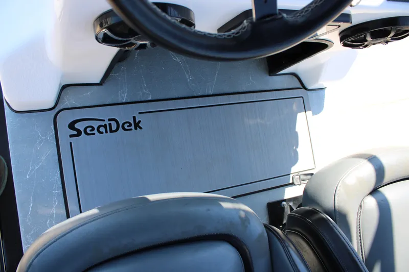 Slide: The Image of 2024 Shoalwater 23 Catamaran battery compartment with Interstate battery and wiring. - 32