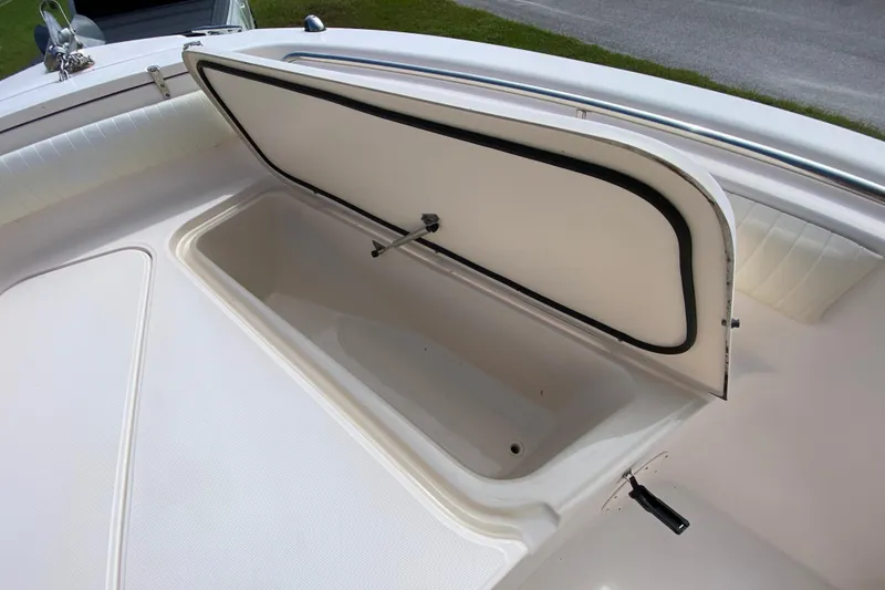 Slide: The Image of Open storage compartment on a 2005 Grady-White Advance 257 boat. - 102