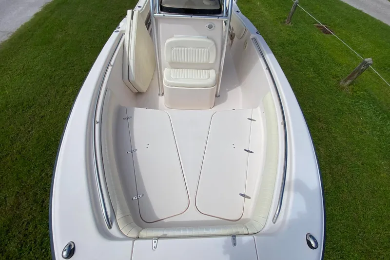 Slide: The Image of 2005 Grady-White Advance 257 boat interior with seating and storage, viewed from above. - 108