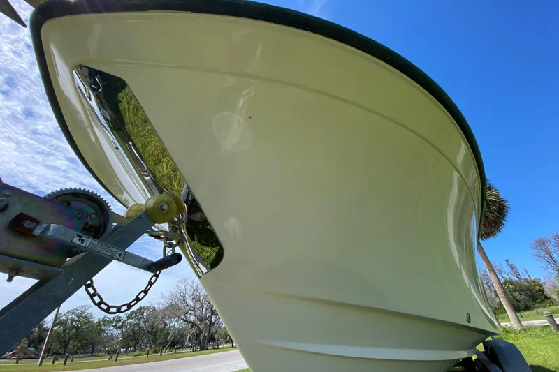 Slide: The Image of 2005 Grady-White Advance 257 boat on trailer, clear sky background. - 18