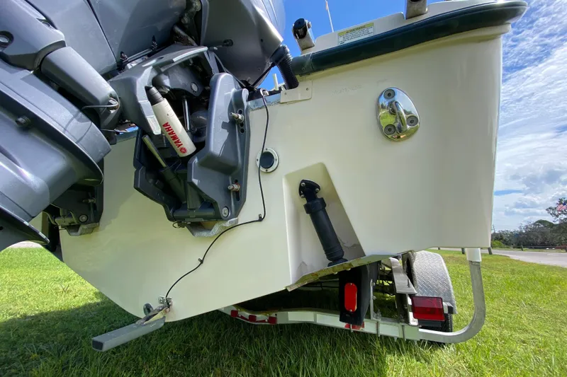 Slide: The Image of 2005 Grady-White Advance 257 boat stern with Yamaha engine on trailer. - 26